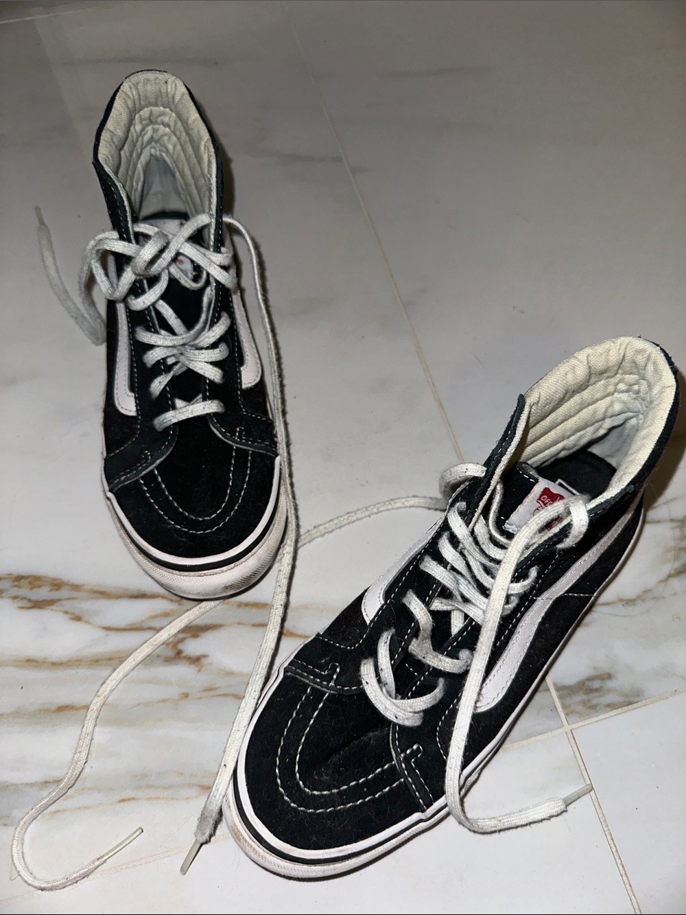 Vans Black and White High-Top Sneakers